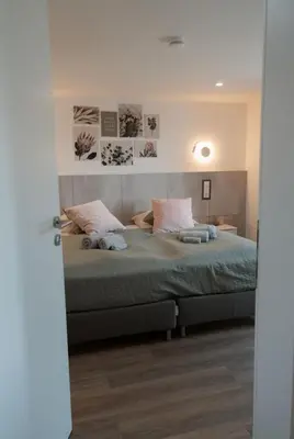 Ein Bett oder Betten in einem Zimmer der Unterkunft FERIENWOHNUNG TRAUMBLICK - Familienfreundlich - Handwerker willkommen