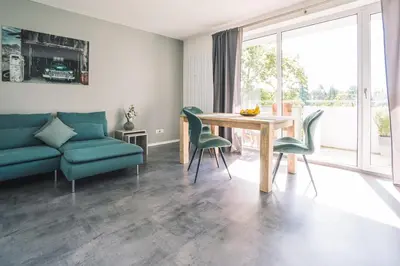 Ein Sitzbereich in der Unterkunft Vintage Apartment Schwetzingen - 2 Zimmer - Küche, Bad & Balkon