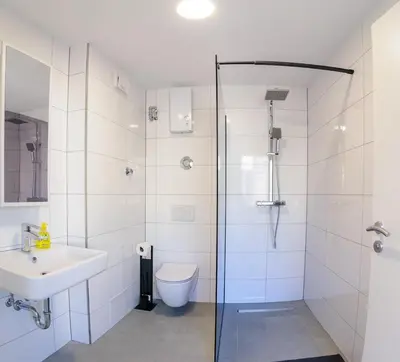 Ein Badezimmer in der Unterkunft MZK Maier Zentrales Apartment