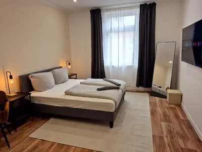 Ein Bett oder Betten in einem Zimmer der Unterkunft Süße Marie 15