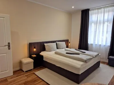 Ein Bett oder Betten in einem Zimmer der Unterkunft Süße Marie 16