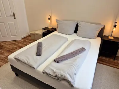 Ein Bett oder Betten in einem Zimmer der Unterkunft Süße Marie 17