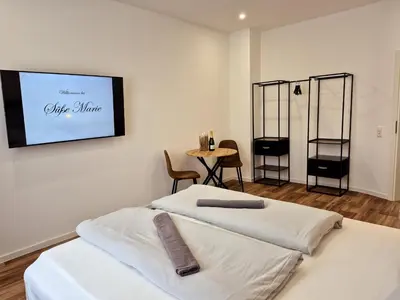 Ein Bett oder Betten in einem Zimmer der Unterkunft Süße Marie 17