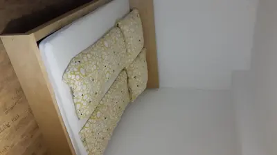 Ein Bett oder Betten in einem Zimmer der Unterkunft Ferienwohnung Lotti Südpfalz