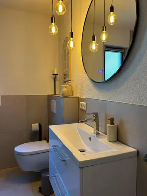 Ein Badezimmer in der Unterkunft Stylische Designwohnung direkt am Schloss Bruchsal mit 80 m2