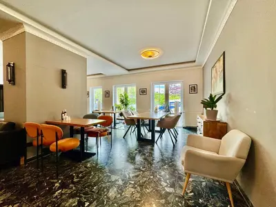 Ein Sitzbereich in der Unterkunft AR Boutique Hotel Heusenstamm