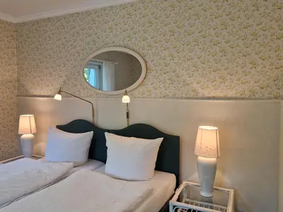 Ein Bett oder Betten in einem Zimmer der Unterkunft Waldquelle Vital Gästehaus