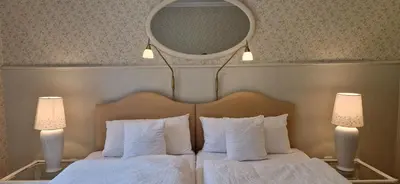 Ein Bett oder Betten in einem Zimmer der Unterkunft Waldquelle Vital Gästehaus