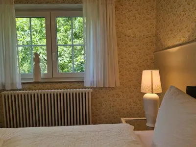 Ein Bett oder Betten in einem Zimmer der Unterkunft Waldquelle Vital Gästehaus