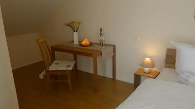 Ein Bett oder Betten in einem Zimmer der Unterkunft Villa Mandelblüte