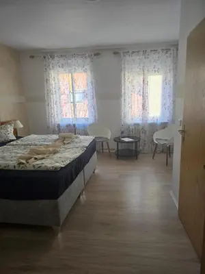 Ein Bett oder Betten in einem Zimmer der Unterkunft Landgasthof Hotel Rebe Alzey