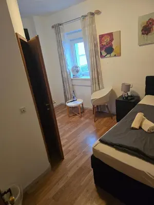 Ein Bett oder Betten in einem Zimmer der Unterkunft Landgasthof Hotel Rebe Alzey