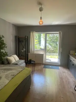 Ein Bett oder Betten in einem Zimmer der Unterkunft Apartment mit Terrasse, 200m Hbf