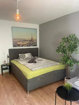 Ein Bett oder Betten in einem Zimmer der Unterkunft Apartment mit Terrasse, 200m Hbf