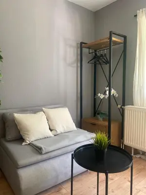 Ein Sitzbereich in der Unterkunft Apartment mit Terrasse, 200m Hbf