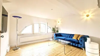 Ein Sitzbereich in der Unterkunft 64 qm Harmonic Design mit Küche, ruhige und begrünte Lage , Innenstadt Ost