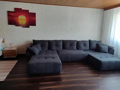 Ein Sitzbereich in der Unterkunft Unterkunft REHBERG Zimmer III
