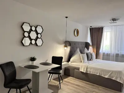 Ein Bett oder Betten in einem Zimmer der Unterkunft Sophie Flair Apartments 2