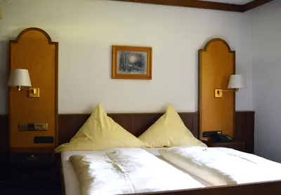 Ein Bett oder Betten in einem Zimmer der Unterkunft Natur & Wander Hotel Gassbachtal