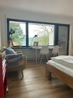 Ein Bett oder Betten in einem Zimmer der Unterkunft Glücks-Quartier Kaffeehof 4