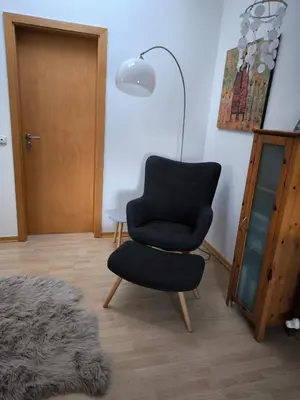 Ein Sitzbereich in der Unterkunft Alexandras Ferienwohnung - Maisonette 90 qm mit Balkon