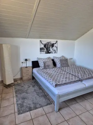 Ein Bett oder Betten in einem Zimmer der Unterkunft Auszeit und Idylle auf dem Pferdehof