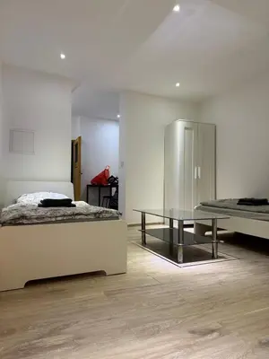 Ein Bett oder Betten in einem Zimmer der Unterkunft Monteur- und Ferienwohnung Neustadt an der Weinstraße