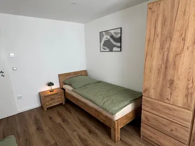 Ein Bett oder Betten in einem Zimmer der Unterkunft Melem Apartments 1
