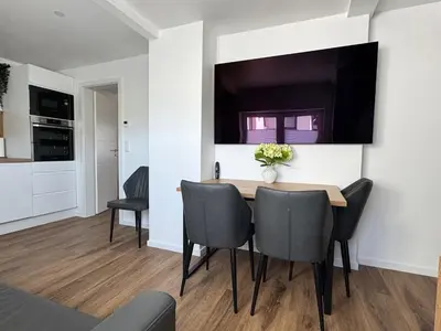 Ein Sitzbereich in der Unterkunft Melem Apartments 1