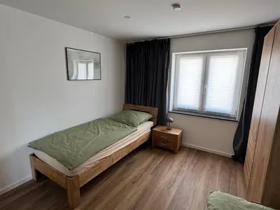 Ein Bett oder Betten in einem Zimmer der Unterkunft Melem Apartments 1