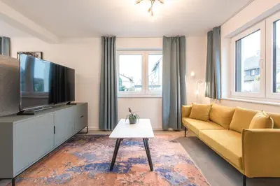 TV/Unterhaltungsangebot in der Unterkunft Studio Bergstrasse 2 PAX NEU Parkplatz
