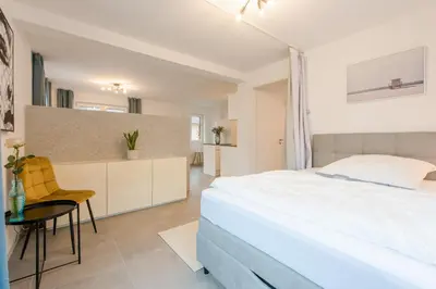 Ein Bett oder Betten in einem Zimmer der Unterkunft Studio Bergstrasse 2 PAX NEU Parkplatz