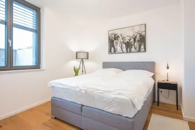 Ein Bett oder Betten in einem Zimmer der Unterkunft Schlossberg Maisonette NEU Terrasse Ausblick