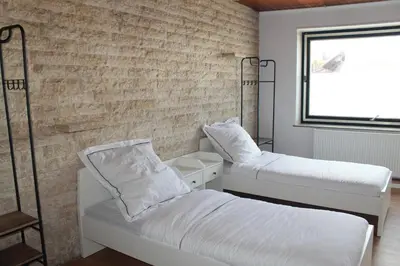 Ein Bett oder Betten in einem Zimmer der Unterkunft Ruhiger Landhaus-Charme mit Top-Anbindung