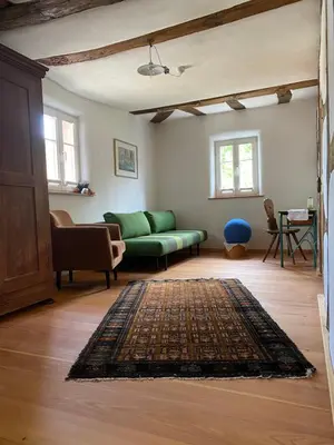 Ein Sitzbereich in der Unterkunft Haus der Behaglichkeit
