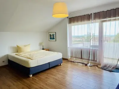 Ein Bett oder Betten in einem Zimmer der Unterkunft LEO Apartments