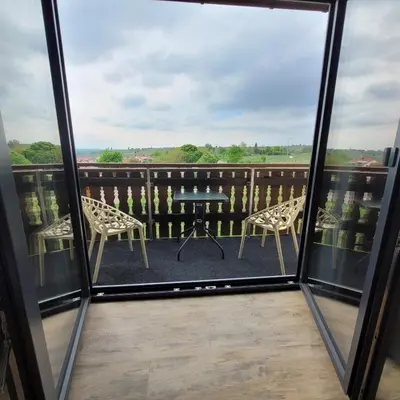 Ein Balkon oder eine Terrasse in der Unterkunft VineSinn