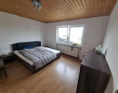 Ein Bett oder Betten in einem Zimmer der Unterkunft Wohnung M voll möbliert