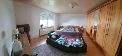 Ein Bett oder Betten in einem Zimmer der Unterkunft Wohnung M voll möbliert