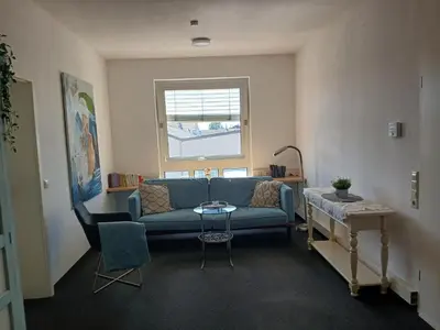 Ein Sitzbereich in der Unterkunft sweet home