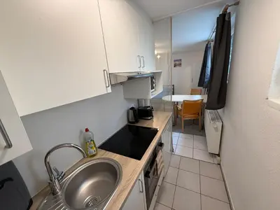 Küche/Küchenzeile in der Unterkunft Cosy studio apartment in a central location