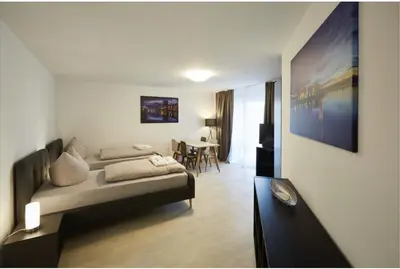 Ein Bett oder Betten in einem Zimmer der Unterkunft LIV Design Apartments Karlsruhe Weststadt