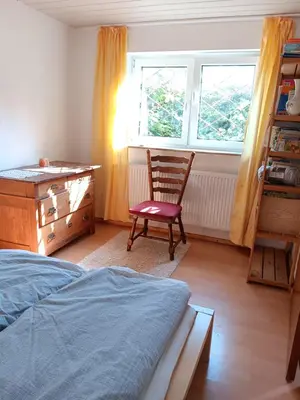Ein Bett oder Betten in einem Zimmer der Unterkunft Kinderfreundliche Wohnung