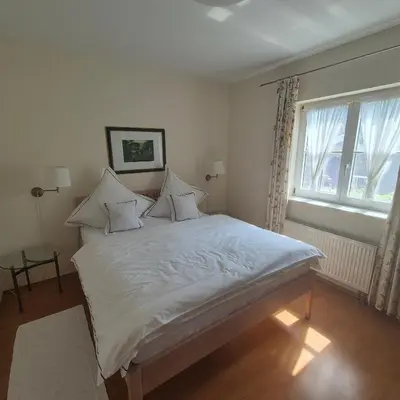 Ein Bett oder Betten in einem Zimmer der Unterkunft Ferienwohnung Dorn
