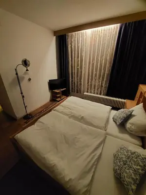 Ein Bett oder Betten in einem Zimmer der Unterkunft Goldner Engel, Restaurant - Hotel - Metzgerei