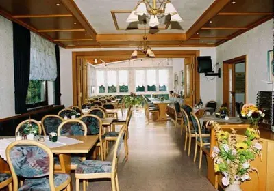Ein Sitzbereich in der Unterkunft Gasthaus Zum Spalterwald