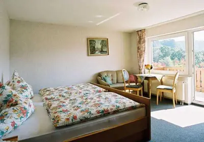 Ein Bett oder Betten in einem Zimmer der Unterkunft Gasthaus Zum Spalterwald