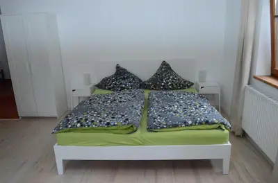 Ein Bett oder Betten in einem Zimmer der Unterkunft Apartment Albert