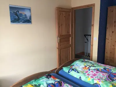Ein Bett oder Betten in einem Zimmer der Unterkunft Ferienhaus Walther