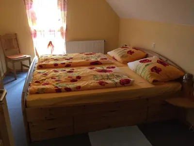 Ein Bett oder Betten in einem Zimmer der Unterkunft Ferienhaus Walther